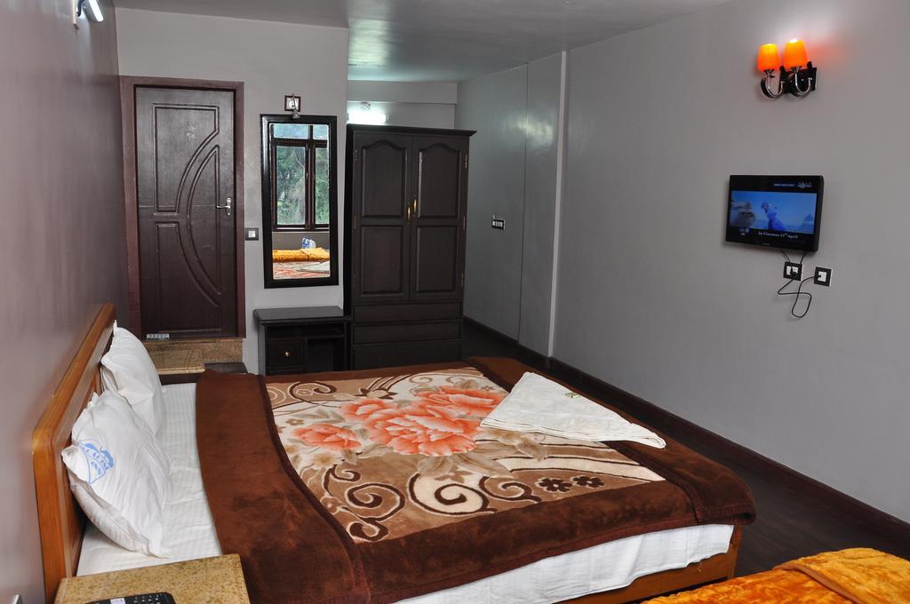 Grand Paradise Inn Kodaikanal Room photo